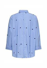 Mėlynos juostelės marškiniai su tamsiai mėlynomis širdelėmis, ilgomis rankovėmis ir apvalia apykakle. Pagaminti iš lengvos medžiagos, laisvo kirpimo.