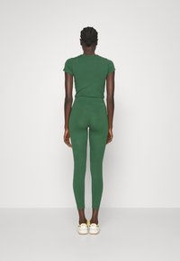 Nike Sportswear Leggings - Byxor - dark green