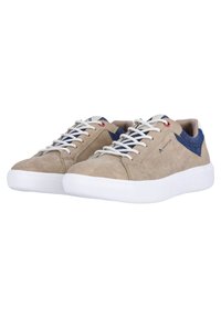 Beige suede sneakers with white rubber soles, denim accents, and beige laces. Side logo in navy blue. Classic low-top design.