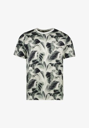 Korte mouwen t-shirt van een lichte stof met een bladerenpatroon in groen en zwart op een lichte achtergrond. Ronde hals, relaxte pasvorm.