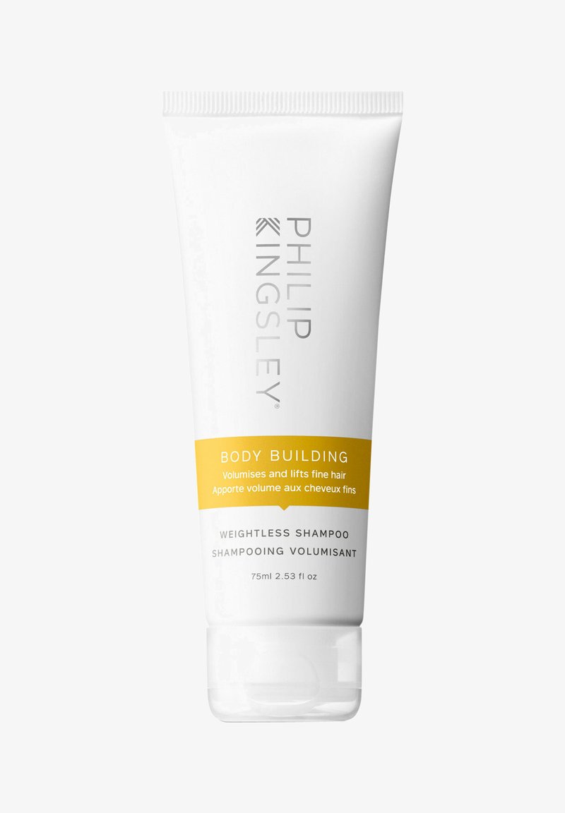 Weißer Tube des Philip Kingsley Body Building Shampoos mit gelbem Akzent, 75 ml, mit eingeprägtem Marken- und Produktnamen in Silber.