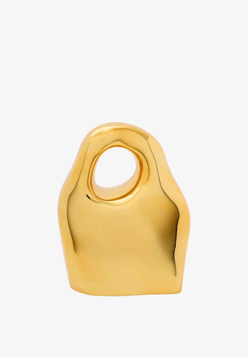 Gulv abstrakt skulptur med glat, reflekterende overflade, der har en afrundet form og en oval åbning på toppen. Ingen yderligere detaljer.