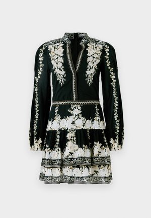 Abito nero con ricami floreali bianchi, maniche lunghe, chiusura con zip anteriore e gonna a strati con accenti decorativi lungo orlo.