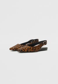 Leopard print slingback flats with pointed toes, soft suede material, black buckle detail, and low flat heels.