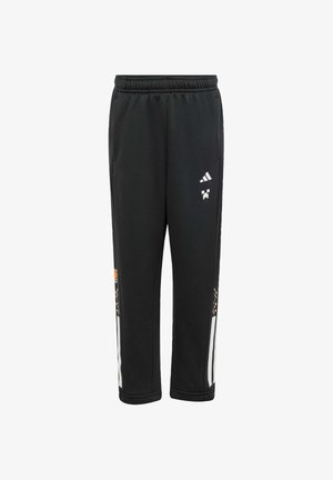 Černé sportovní kalhoty s elastickým pasem, obsahující bílé detaily a barevné postranní akcenty. Vyrobené z hladké, lehké tkaniny.