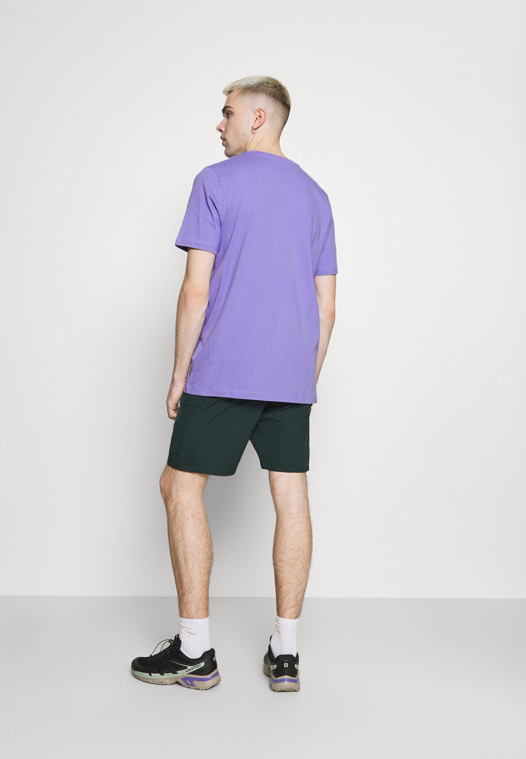 purple white and black shirt