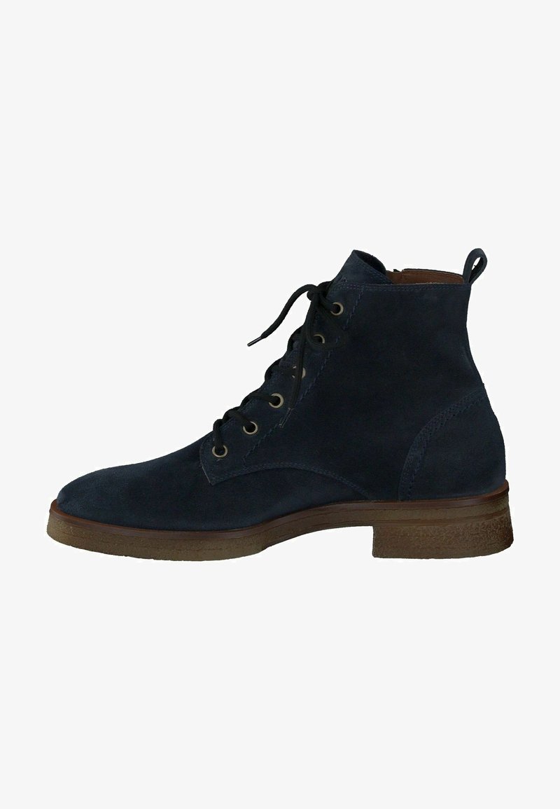 Botas de ante azul marino hasta el tobillo con puntera redonda, parte delantera de cordones, ojales de metal y una suela de goma texturizada marrón. Tacón reforzado para mayor soporte.