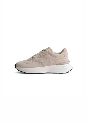 Beige suede athletic shoe with a white textured midsole and black rubber outsole. Features a laced design and rounded toe.