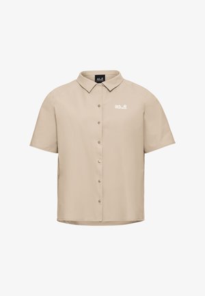 Chemise beige à manches courtes avec col et logo "Jack Wolfskin" sur la poitrine gauche.