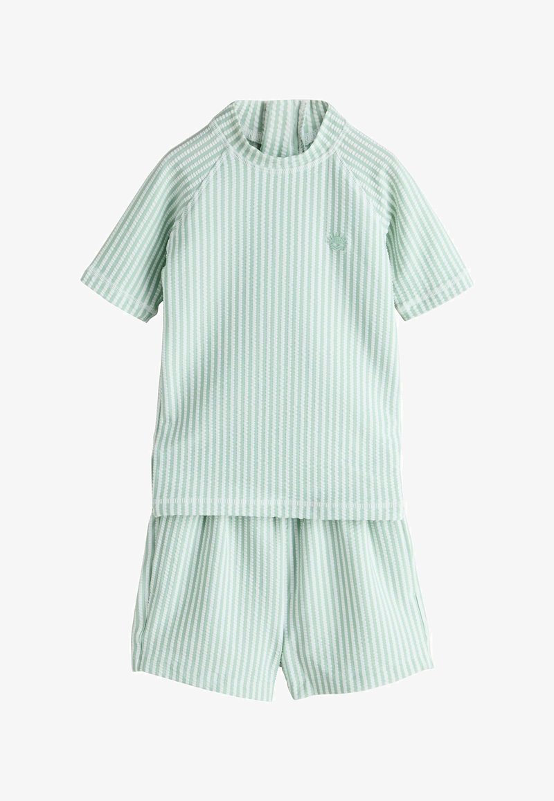 Lichtgroen gestreept T-shirt met korte mouwen en bijpassende korte broek. Gemaakt van zacht stof, met een ronde hals en lichte rekbaarheid.