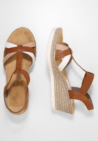 Rieker Plateausandalette - bianco/cognac