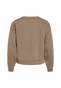 Brun, kort sweatshirt med rund halsringning, sänkt axel och ribbade ärmslut. Tillverkad av mjukt tyg med en slät yta.