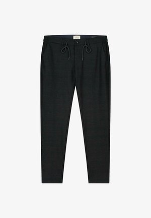 Mustad mustrehahad muste tõmblukuga, millel on peen kontrollmustri ja pehme, tekstuuriga kangas. Kohandatud istuvus küljetaskutega.