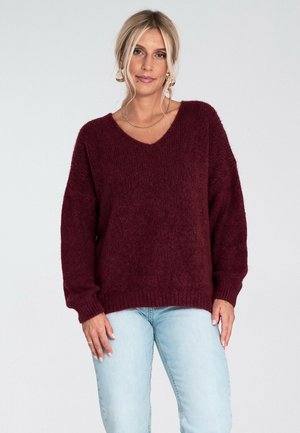 - Sweter