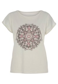Camiseta de manga corta de color beige claro con un estampado central de mandala floral en rosa y negro. Tejido suave con un corte holgado y escote redondo.