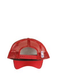 Red mesh baseball cap with a solid red visor. Features adjustable snapback closure and an NBA logo patch on the side.