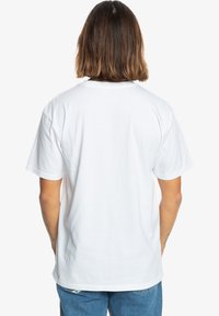 White short-sleeve t-shirt made from cotton, featuring a relaxed fit and classic crew neck, smooth texture, and no visible patterns or graphics.