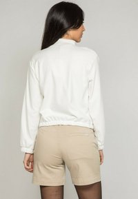 Dona x Lisa Sweat polaire - blanc