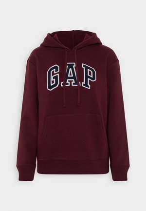 Bordowa bluza z kapturem, z przednią kieszenią i sznurkiem ściągającym w kapturze oraz białym haftowanym logo "GAP". Miękka tkanina z prążkowanymi mankietami i dołem.