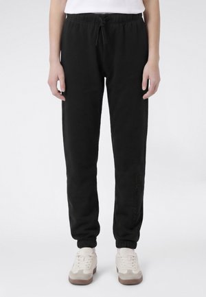 Champion CUFFED PANTS  - Pantalon de survêtement - black
