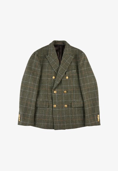 Podwójnie zapinana kurtka w zielono-brązowy wzór w pied-de-poule, z złotymi guzikami, dwiema przednimi kieszeniami i klapami w kształcie ostrokształtnym.