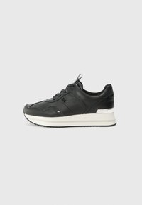 Black leather sneaker with a smooth texture, featuring a round toe, front lacing, and a white and silver accent on the sole.