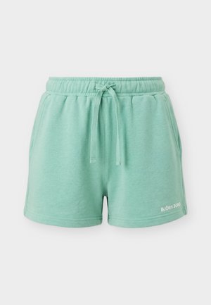 Shorts décontractés vert menthe avec taille élastique, cordon de serrage, poches latérales et petit logo blanc "BJÖRN BORG" sur l'ourlet gauche.