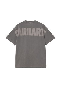 T-shirt grigio a maniche corte con grande scritta sbiadita "CARHARTT" stampata sulla parte superiore della schiena.