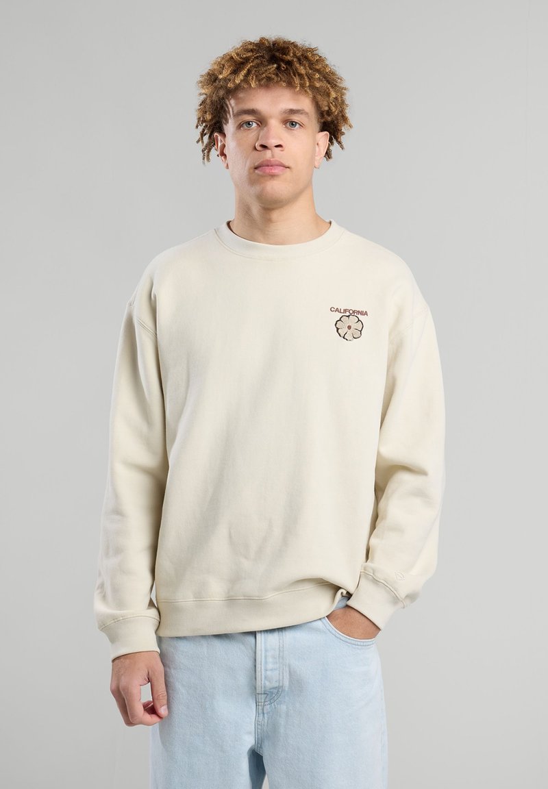 Sudadera de color beige claro, material de algodón, con cuello redondo, puños y dobladillo de canalé, que presenta el texto 'CALIFORNIA' y un diseño de flores en marrón.