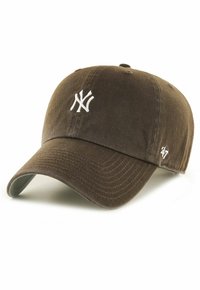 Brown cotton baseball cap with a white embroidered NY logo on the front and a small white '47' on the side. Curved brim, textured fabric.