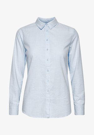 Vaaleansininen raidallinen nappikauluspaita, jossa on pitkät hihat. Valmistettu sileästä kankaasta; siinä on pieniä nappeja ja pyöristetyt helmat.