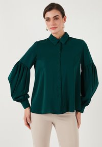 Unselected, emerald green