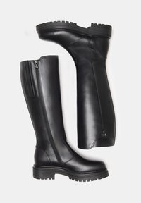 Black leather knee-high boots featuring a chunky sole, side zipper, and smooth texture; designed with minimal detailing and sturdy construction.