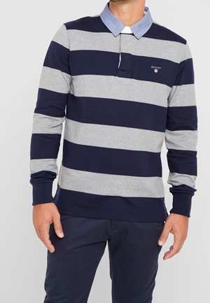 Mørkeblå og grå stribet langærmet polo skjorte med en chambray krave og broderet logo, lavet af bomuldsstof for maksimal komfort.