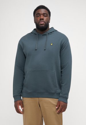 Donkerblauwe katoenen hoodie met een voorzak, geel geborduurd logo op de borst en een capuchon met trekkoord. Gladde textuur.
