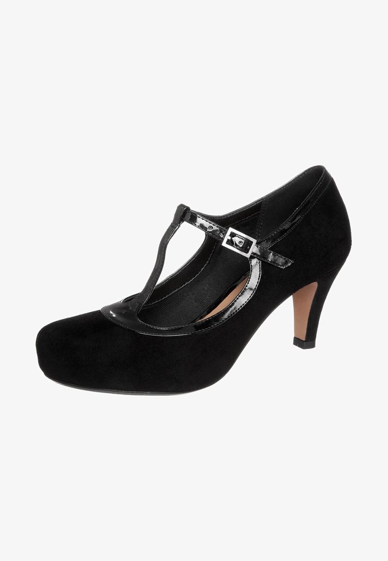 Chaussure Mary Jane à talon haut en daim noir avec bout rond, bride en T et boucle réglable sur le côté, talon de hauteur moyenne.