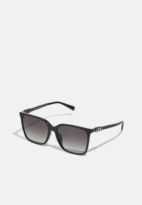 Black square sunglasses with gradient lenses, featuring a polished gold accent on the frame and smooth plastic texture.