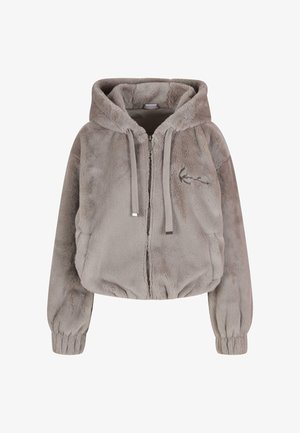 Krótka bluza z kapturem na zamek błyskawiczny w miękkim szarym futerku, z kapturem ze sznurkiem i ściągaczami przy mankietach. Dyskretny akcent logo na klatce piersiowej.