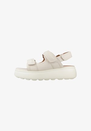 White platform sandal with thick sole, adjustable Velcro straps over toes and ankle, and open heel design.