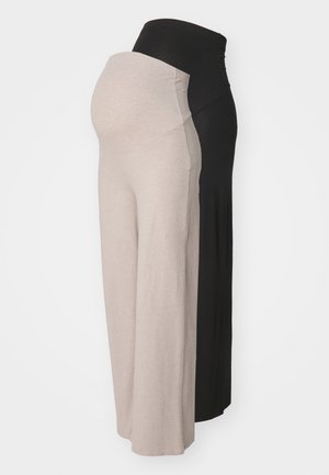 Pantalons de maternité en beige et noir. Fabriqués en tissu doux, dotés d'une taille extensible pour plus de confort, avec une coupe décontractée et sans motifs visibles.