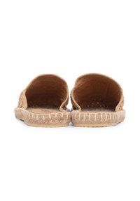 Espadrillas intrecciate beige con design aperto, caratterizzate da una suola in juta intrecciata e un interno tessurizzato.