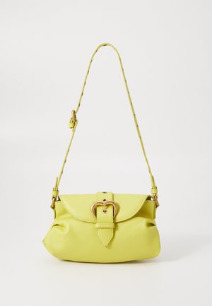 Yellow faux leather handbag with a fold-over flap, gold hardware accents, and a slim strap. Features a textured pattern along the strap.