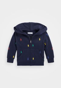Navy zip-up hoodie crafted from cotton, featuring multicolored polo player embroidery, a front pocket, and a drawstring hood.