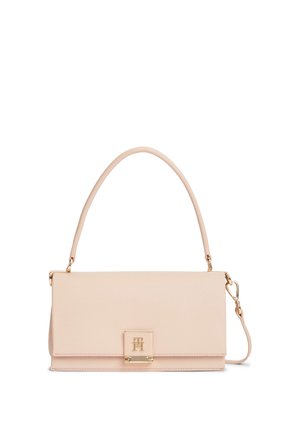Sac à main rectangulaire en cuir beige clair avec une poignée supérieure, un fermoir doré avec logo "TH" et une bandoulière réglable.