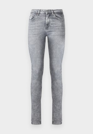 Jeans skinny en denim gris avec taille haute, cinq poches et un léger dégradé sur l'ensemble. Dotés d'une fermeture éclair et d'un bouton.