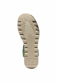 Suola di sandalo alato caratterizzata da una superficie in gomma beige texturizzata, scanalature per la trazione e un prominente logo 'FLY LONDON'.