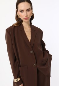 Modanisa EXCLUSIVE brązowy