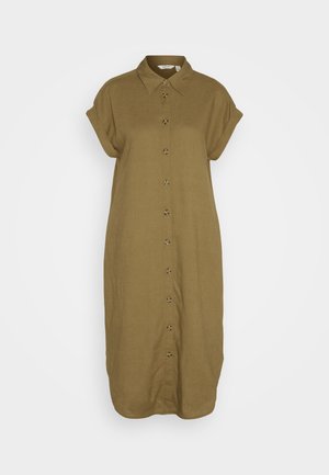 Robe chemise kaki avec un devant à boutons, des manches courtes retroussées et une coupe ample. Fabriquée en tissu texturé avec une finition lisse.