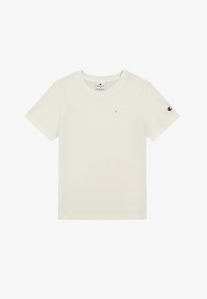 Camiseta de algodón color crema claro con mangas cortas, cuello redondo y un pequeño logo rojo en el pecho y la manga izquierda. Textura suave, diseño casual.
