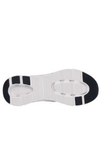 Sole in gomma bianca con scanalature testurizzate, caratterizzata da dettagli neri. Il logo "SKECHERS" è impresso sulla parte inferiore vicino al tallone.